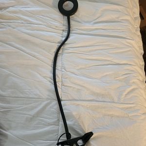 Adjustable desk clamp on light.